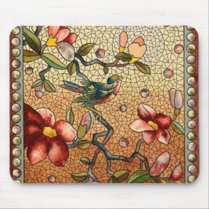 Stained glass style bird on a flowering tree mouse mat