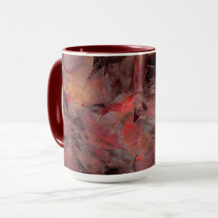 Stains in red hues on black grey grainy background mug