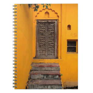 STAIRCASE IN FRONT OF WOODEN DOOR NOTEBOOK