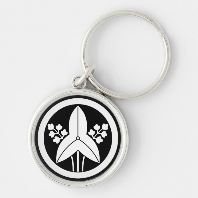 Standing arrowhead in a circle key ring (Front)