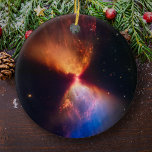 Star Birth, James Webb Space Telescope Christmas Ceramic Tree Decoration<br><div class="desc">This beautiful new infrared visual shows protostar L1527 as it is gathering material from nearby clouds to feed its growth. This photograph was taken by the James Webb Space Telescope Near-Infrared Camera (NIRCam). The protostellar phase is one of the earliest phases of stellar evolution. This star is in its earliest...</div>