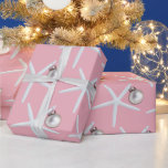 Starfish Pattern Pink Christmas Gift Wrap<br><div class="desc">Tropical themed,  pink Christmas wrapping paper with big white starfish and ornament design.  An unconventional holiday colour with design meant for those living in a warm climate.  Choose a roll length and impress recipients with this high quality wrapping paper.</div>