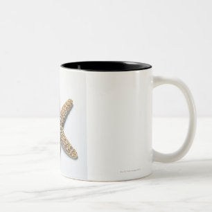 Starfish shell on white background Two-Tone coffee mug