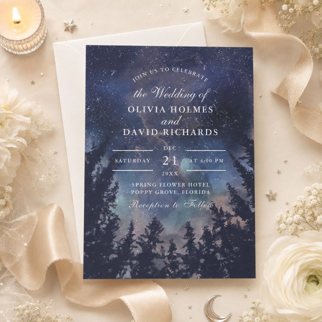 Starry Night Forest Wedding Invitation (Starry Night Forest Celestial Wedding Invitation on a table with flowers and celestial decor)