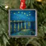 Starry Night Over the Rhône | Vincent van Gogh Metal Tree Decoration<br><div class="desc">Starry Night Over the Rhône (1888) by Vincent van Gogh is a mesmerising Post-Impressionist painting that captures a serene nighttime view of the Rhône River in Arles, France. The artwork features a deep blue sky adorned with shimmering golden stars and their reflections on the water. In the foreground, two figures...</div>