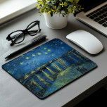 Starry Night Over the Rhône | Vincent van Gogh Mouse Mat<br><div class="desc">Starry Night Over the Rhône (1888) by Vincent van Gogh is a mesmerising Post-Impressionist painting that captures a serene nighttime view of the Rhône River in Arles, France. The artwork features a deep blue sky adorned with shimmering golden stars and their reflections on the water. In the foreground, two figures...</div>