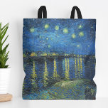 Starry Night Over the Rhône | Vincent van Gogh Tote Bag<br><div class="desc">Starry Night Over the Rhône (1888) by Vincent van Gogh is a mesmerising Post-Impressionist painting that captures a serene nighttime view of the Rhône River in Arles, France. The artwork features a deep blue sky adorned with shimmering golden stars and their reflections on the water. In the foreground, two figures...</div>