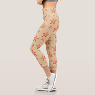 Starry pattern in gradient terracotta orange capri leggings
