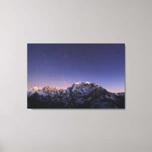 Starry sky above mountains canvas print