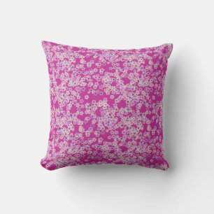 Stars, shades of lilac against magenta cushion