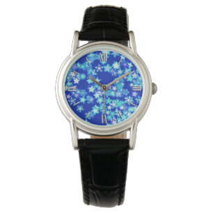 Stars, shades of pale blue against dark blue watch