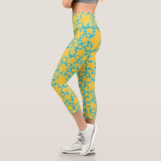 Stars, Stars, Stars in Turquoise and Yellow Capri Leggings (Left)