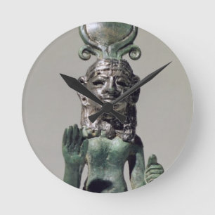 Statuette of a Phoenician goddess, from the Phoeni Round Clock