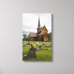 Stave church with graveyard in Norway Canvas Print