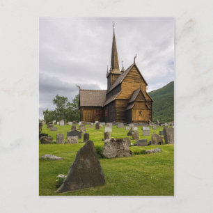 Stave church with graveyard in Norway Postcard