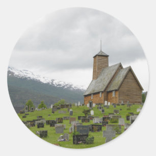 Stave church with graveyard, Norway round sticker