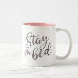 Stay in Bed Rose Quartz Typography Quote Two-Tone Coffee Mug<br><div class="desc">Take your morning coffee in bed with our super cute typography quote mug. Design features "Stay in Bed" in black handwritten style script typography,  filled in with pink Rose Quartz,  a 2016 colour of the year. Looks great on the two-tone mug with pink interior!</div>