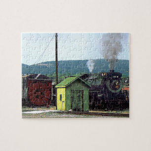 Steam Locomotive Coming into Train Yard Jigsaw Puzzle