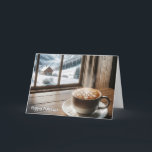 Steaming Snowflake Latte By a Winter Window Holiday Card<br><div class="desc">A steaming cup of coffee with a snowflake latte art sits on a wooden table overlooking a snowy mountain landscape through a large window.
All text can be changed.</div>