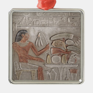 Stela depicting the deceased metal tree decoration