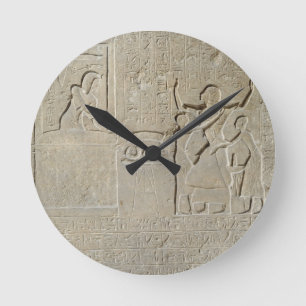 Stele of the necklaces, Hormin receiving the gold Round Clock