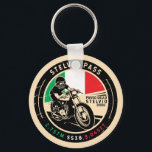 Stelvio Pass | Passo Dello Stelvio | Motorcycle Key Ring<br><div class="desc">Stelvio Pass done in a vintage,  distressed style emblem. It is a famous mountain pass found along the Eastern Alps in Italy.</div>