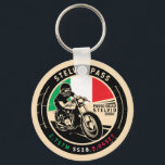 Stelvio Pass | Passo Dello Stelvio | Motorcycle Key Ring<br><div class="desc">Stelvio Pass done in a vintage,  distressed style emblem. It is a famous mountain pass found along the Eastern Alps in Italy.</div>