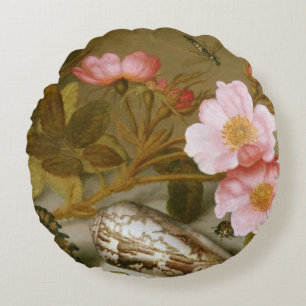 Still life depicting flowers round cushion