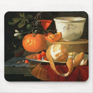 Still life of an orange mouse mat