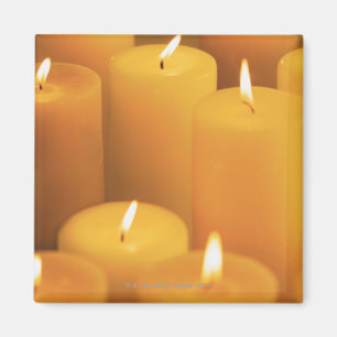 Still life of lighted candles magnet