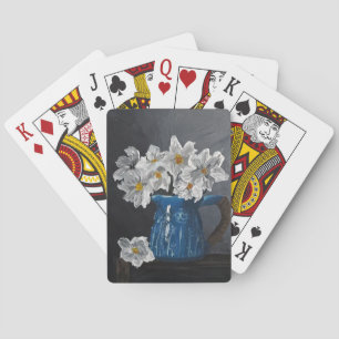 Still life: white flowers in a blue pitcher playing cards