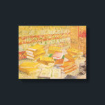 Still Life with French Novels | Vincent van Gogh Canvas Print<br><div class="desc">Still Life with French Novels and Glass with a Rose (1887) by Dutch post-impressionist artist Vincent Van Gogh. Original artwork is an oil on canvas depicting an stacks of books in warm yellow tones.

Use the design tools to add custom text or personalise the image.</div>