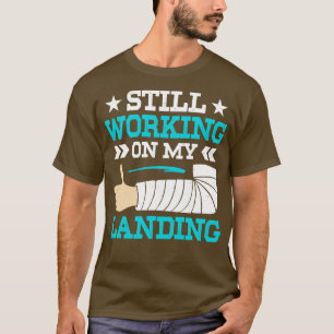 Still Working On My Landing Funny Arm Surgery Surv T-Shirt