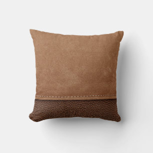 Stitched leather: grey, black background. cushion