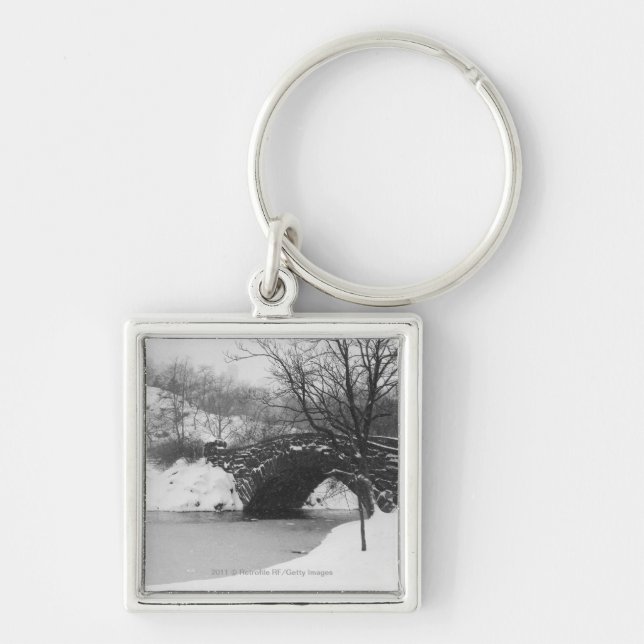 Stone bridge over snow covered river key ring (Front)