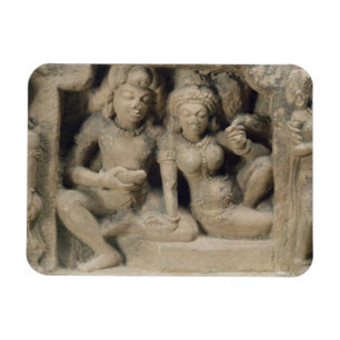 Stone carving of lovers enjoying a dance performan magnet