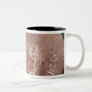 Stone inscribed with a dancer Two-Tone coffee mug