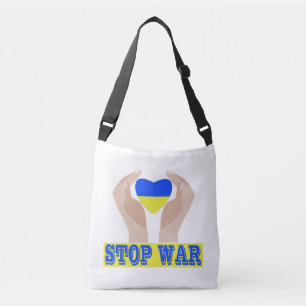 Stop war Ukrainian flag heart in hands Crossbody Bag
