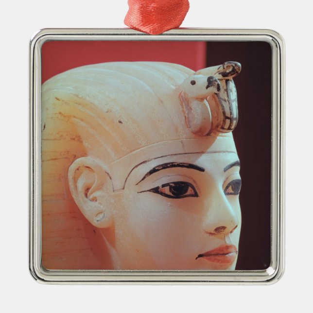 Stopper from one of the canopic urns metal tree decoration (Front)