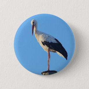 Stork on pole 6 cm round badge