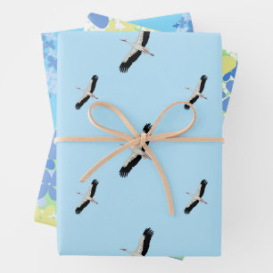 Storks and wild flowers wrapping paper sheet