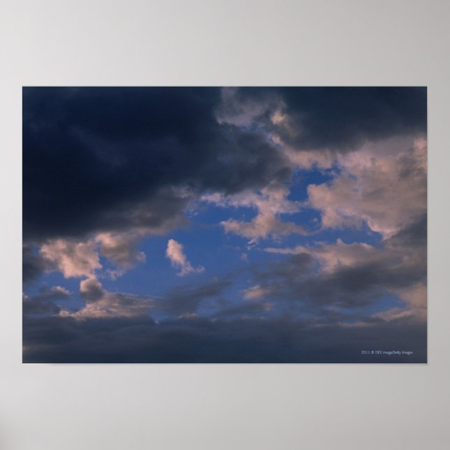 Storm clouds against blue sky poster (Front)