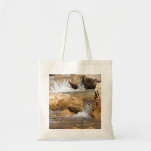 Stormy stream in spring tote bag