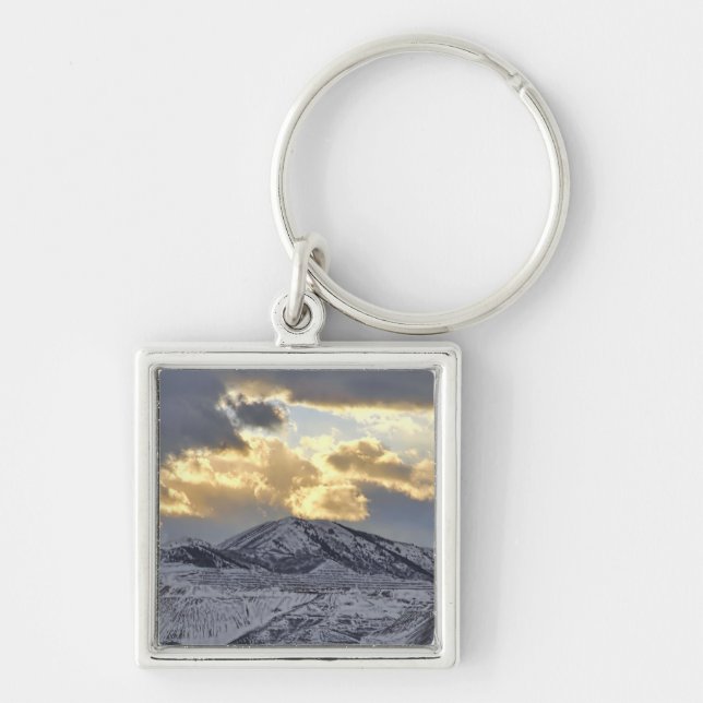 Stormy Sunset Over Snow Capped Mountains Key Ring (Front)