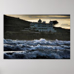 Stormy view, Burgh Island Hotel, Devon Poster<br><div class="desc">A poster print showing a stormy view of the Hotel on Burgh Island. Threatening surf sweeps in from the Atlantic to beat against the shores of Burgh Island. This is the hotel often frequented by Agatha Christie,  Noel Coward and others in the 'set' at the time. 
Image code: brghislhotl</div>