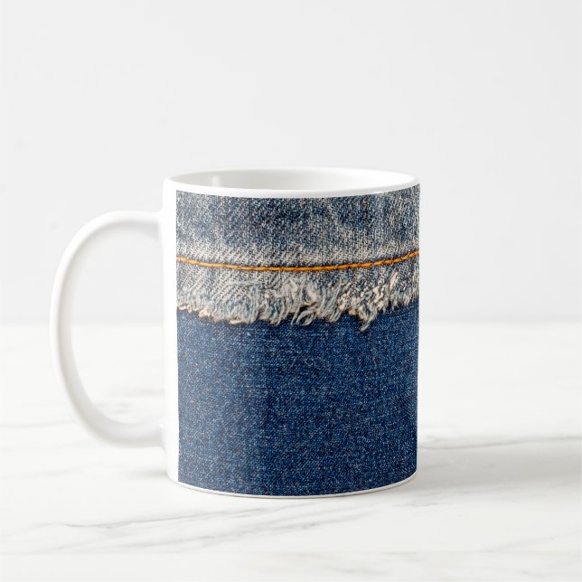 Straight stitch with orange thread on bleached den coffee mug (Left)