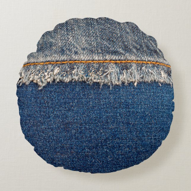Straight stitch with orange thread on bleached den round cushion (Front)