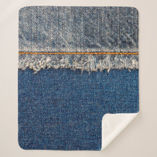 Straight stitch with orange thread on bleached den sherpa blanket