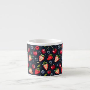 Strawberries and cherries on a dark background espresso cup
