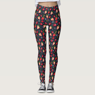 Strawberries and cherries on a dark background leggings